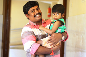 top-image-iyyappan-holding-child